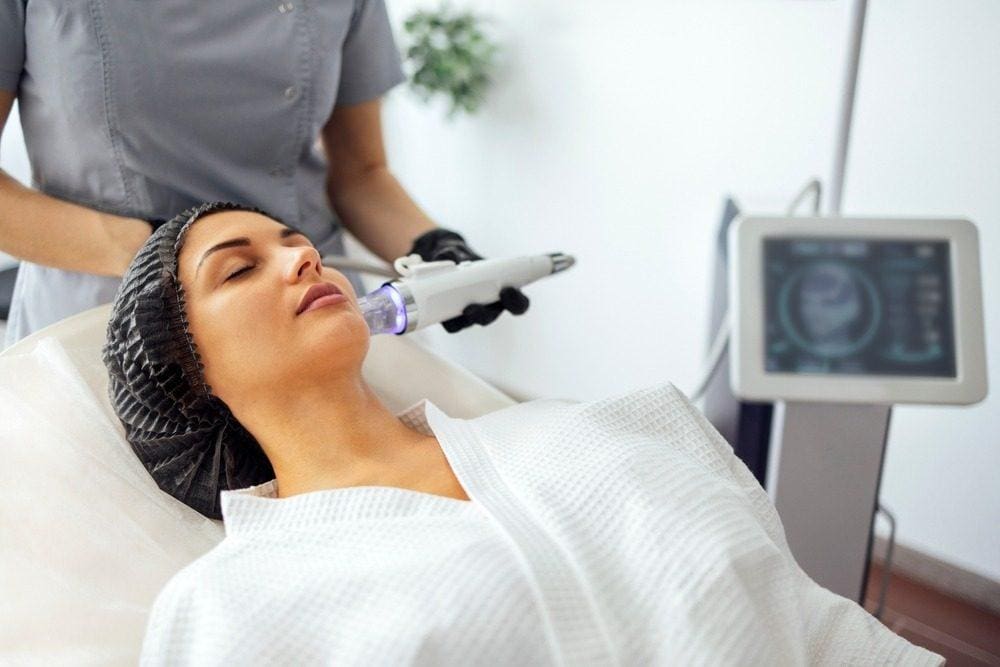 Woman undergoing Potenza Laser Treatment